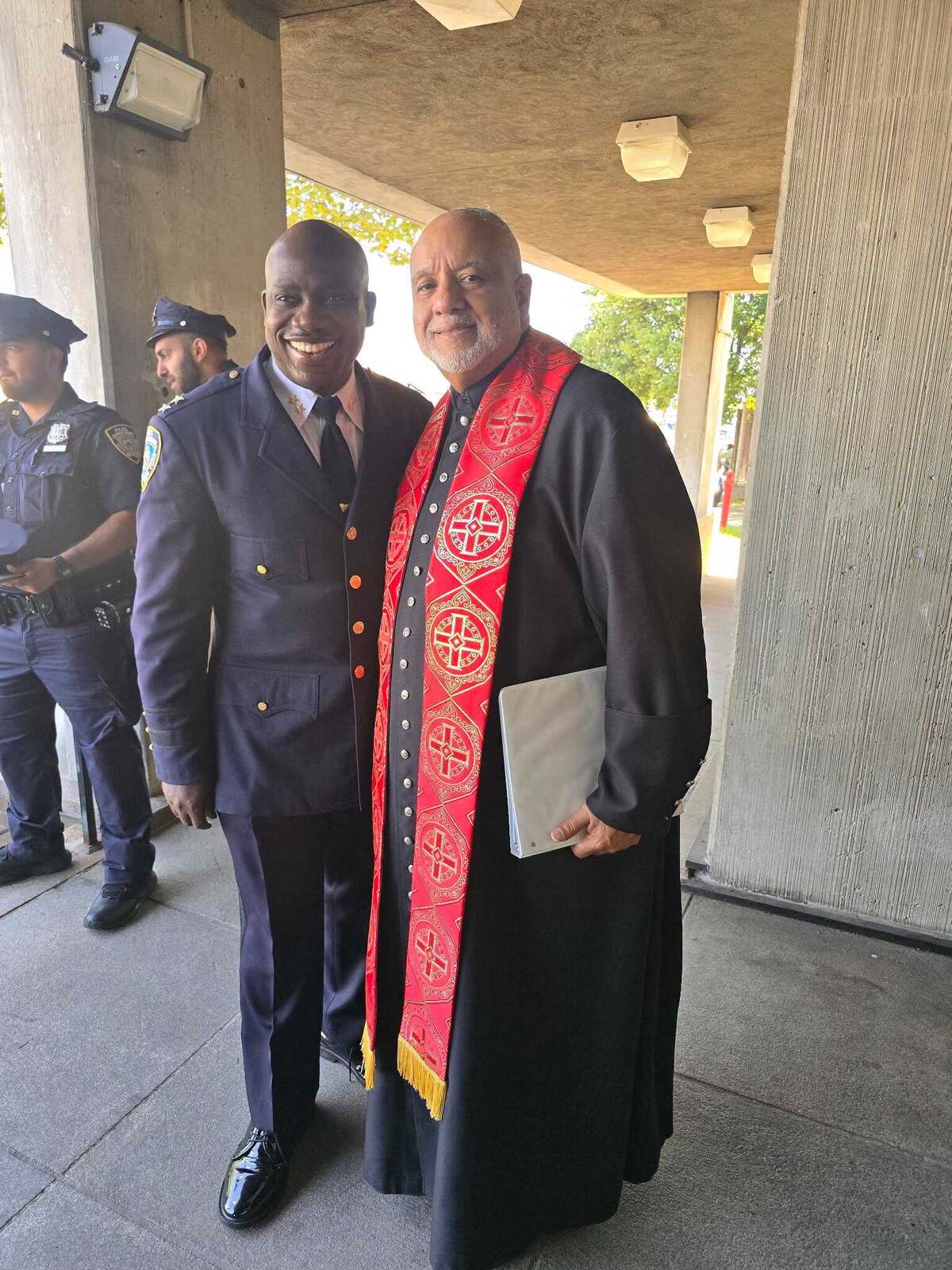 Pastor John H. Boyd II with a fellow clergy member